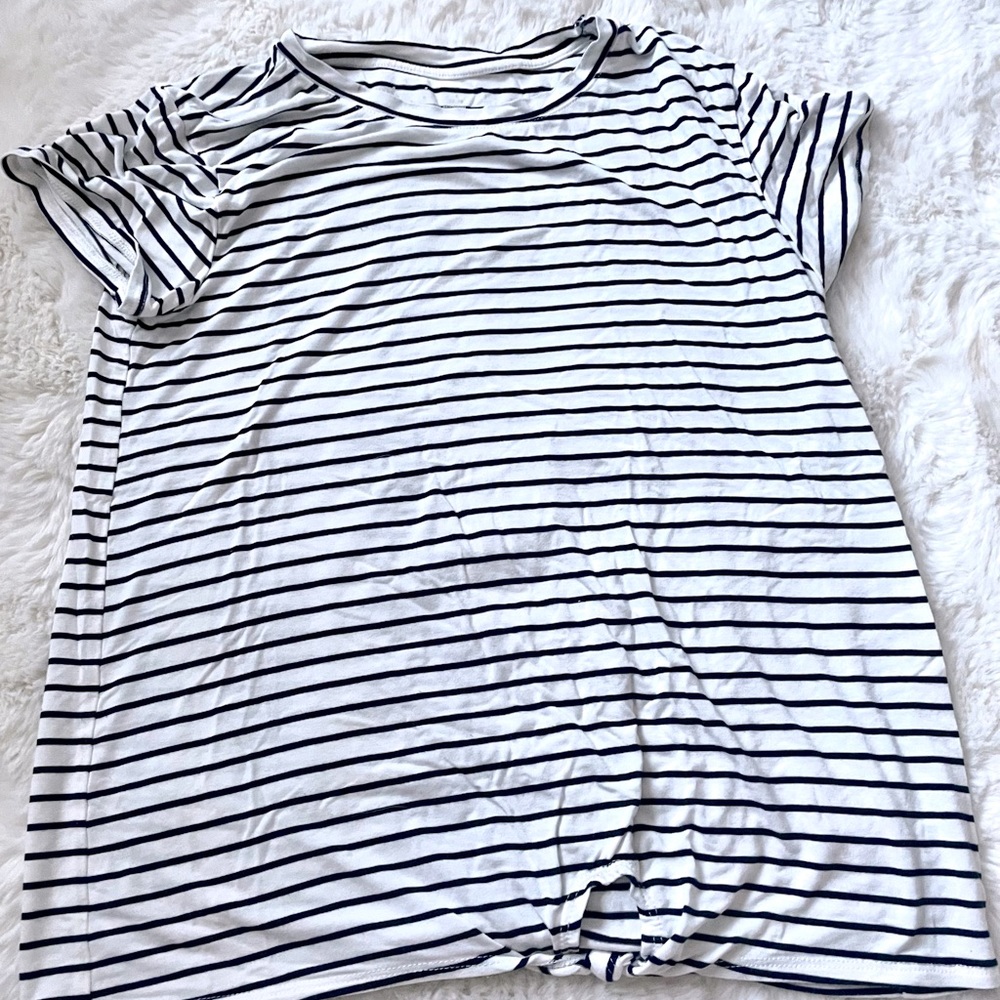 A striped kids t-shirt with tie on bottom